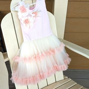 Girls dress size 5/6, peachy-pink with lots of tulle and ruffles